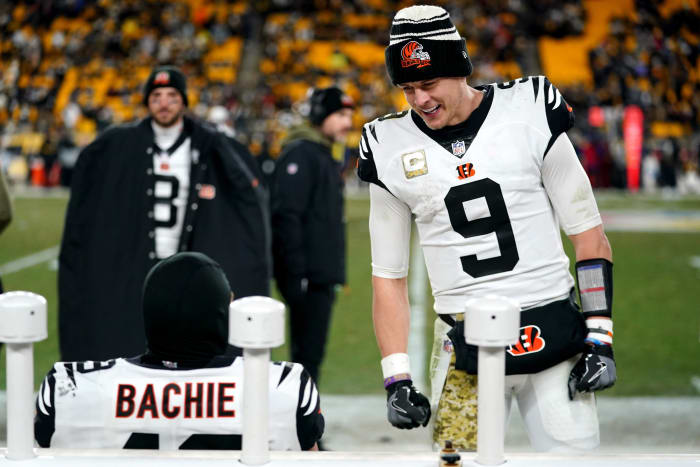 Cincinnati Bengals quarterback Joe Burrow (9) jokes with Cincinnati Bengals Cincinnati Bengals linebacker Joe Bachie in the fourth quarter during a Week 11 NFL game against the Pittsburgh Steelers, Sunday, Nov. 20, 2022, at Acrisure Stadium in Pittsburgh, Pa. The Cincinnati Bengals won, 37-30. Nfl Cincinnati Bengals At Pittsburgh Steelers Nov 20 0346